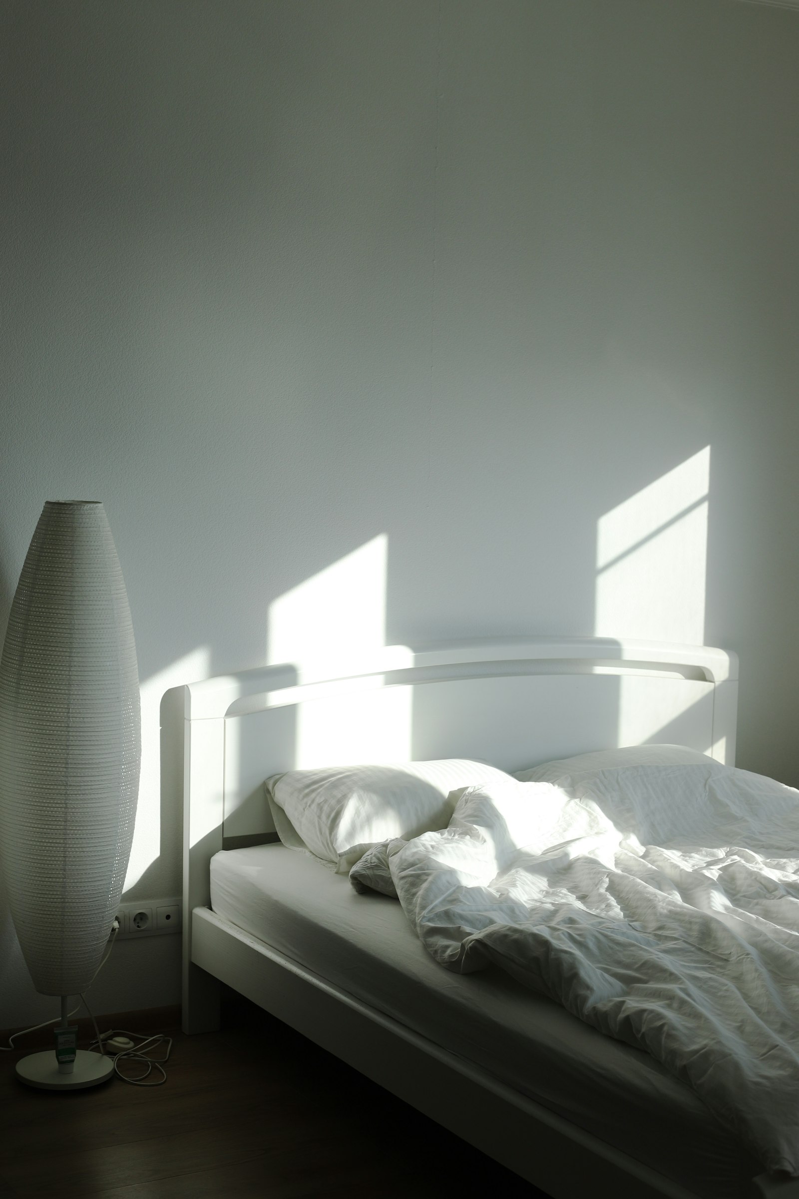 A bed in soft morning light